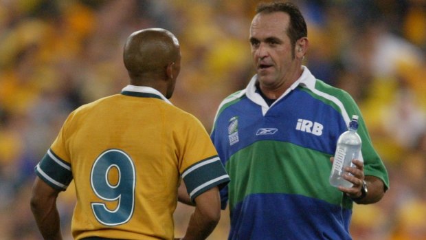 High profile: Andre Watson shoots the breeze with George Gregan during the 2003 World Cup final. 