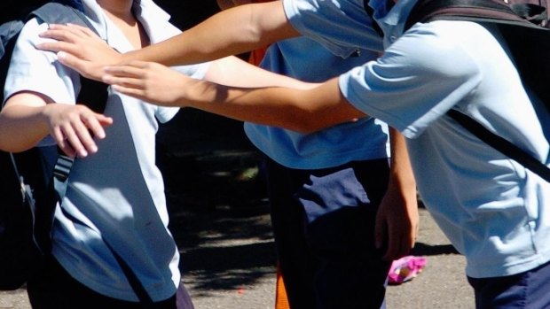 Threatened: Principals say bullying is not just happening on the playground.