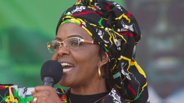 Zimbabwe's first lady Grace Mugabe greets party supporters at a rally in Chinhoyi, Zimbabwe in July.