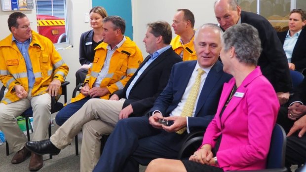 Prime Minister Malcolm Turnbull chats to Esperance Shire president Victoria Brown before a briefing from Esperance volunteer fire captain Lonica Collins.