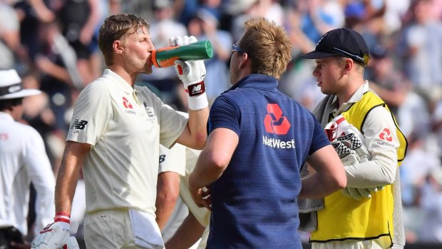 Water works: Hydration was all-important in the heat, but fluid intake might not have been enough for Joe Root.