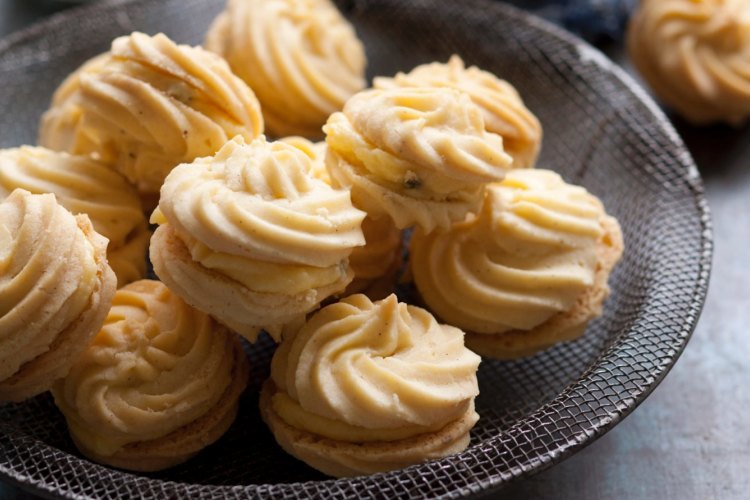 Melting moments with passionfruit icing.