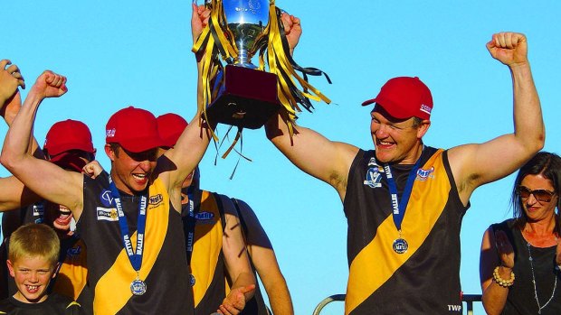 Sweet success: Sea Lake-Nandaly Tigers coaches Joey Summerhayes and Jarrod Arentz celebrate their 2014 flag.