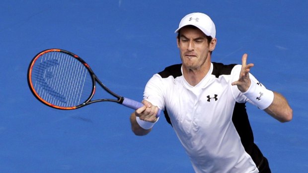 Andy Murray hits a forehand return.