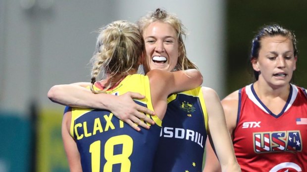 Back in the fold: Emily Hurtz celebrates with Jane Clayton during Australia's win over the United States.