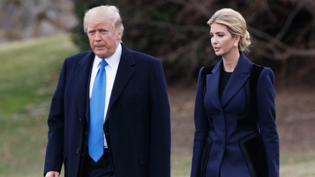 President Donald Trump and his daughter Ivanka walk to board Marine One on the South Lawn of the White House in Washington.