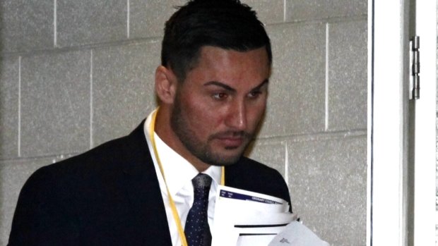 Salim Mehajer leaves Auburn council chambers in August.