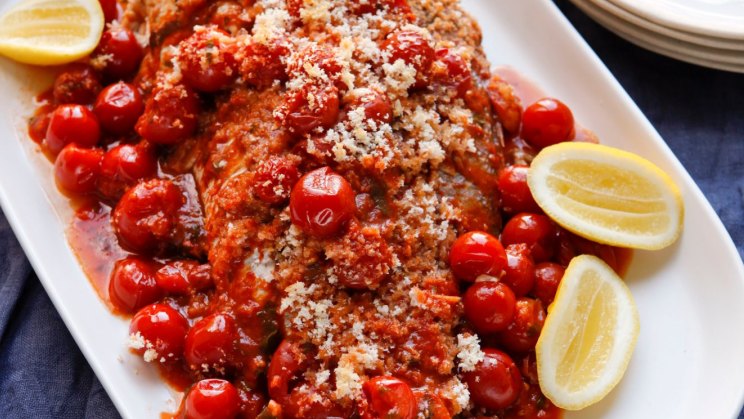 Baked fish with tomatoes and breadcrumbs recipe-image