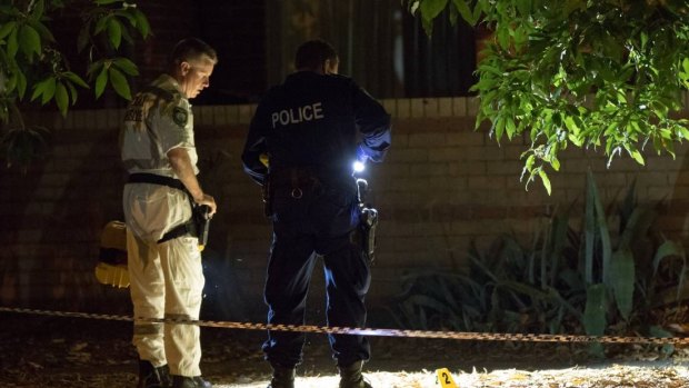 Police investigate after a man was shot in the face at a unit block in Hamilton on December 18.
