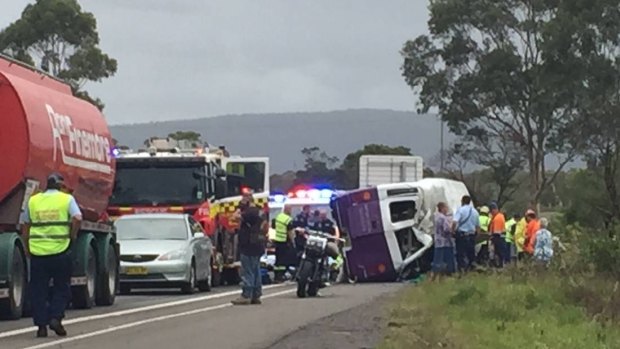 One person was killed and seven injured when a bus overturned on the M1 south of Wollongong.