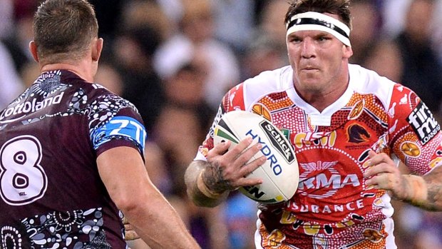 Incoming: Josh McGuire takes on the Manly defence.