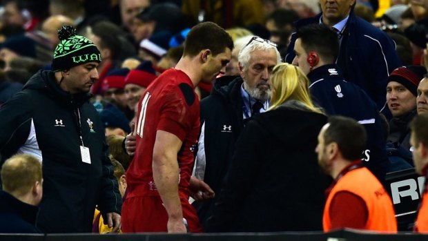 Wales player George North  leaves the field for treatment against England in the Six Nations.