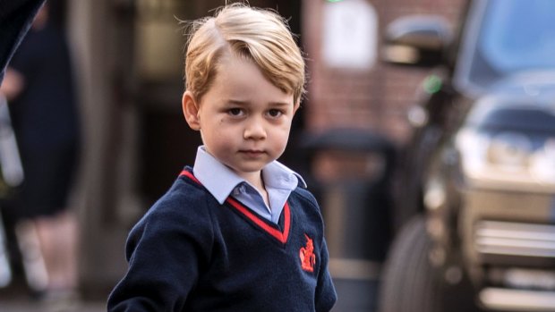 Britain's Prince George arrives for his first day of school at Thomas's school in Battersea, London.
