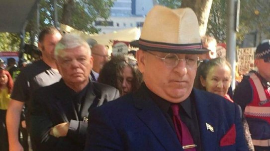 Nathan Sykes (front) and chairman of the Australia First party, Jim Saleam (behind) attending Melbourne Magistrates Court in March, 2017, to support Christopher Shortis, who faced charges over a mock beheading to protest against the Bendigo mosque.
