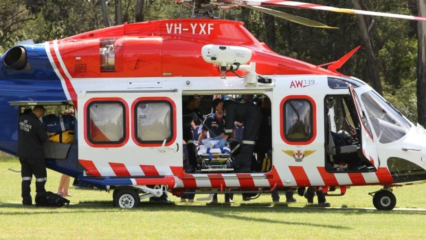 Paramedics on Friday preparing to airlift the girl to the Royal Children's Hospital in Melbourne.