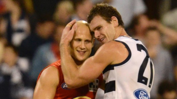 Gary Ablett shares a moment with Cam Mooney.