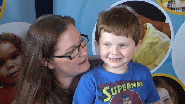 Diabetic Xavier Hames (pictured with mum Naomi) became the first person to be fitted with a device that monitors his glucose levels 