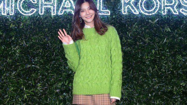 Korean actress Cha Ye-Ryun says hello to the colour of the year, with a cable-knit jumper. 