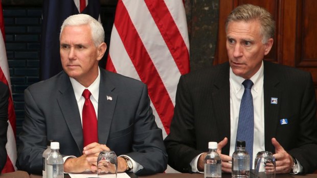 Canberra Charge d' Affaires James Carouso (right) with US Vice-President Mike Pence