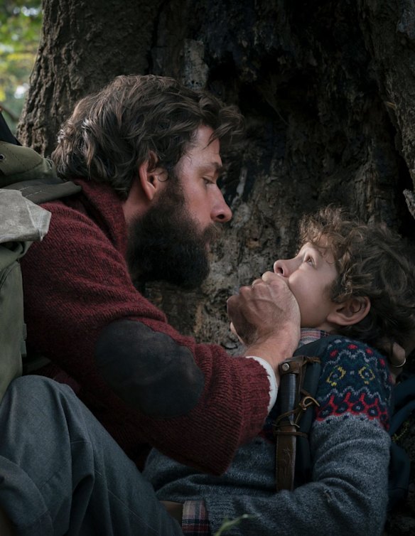 John Kransinski and Noah Jupe in A Quiet Place. 