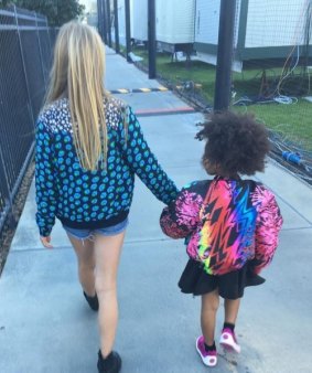 Apple Martin and Blue Ivy Carter backstage at Super Bowl 50.