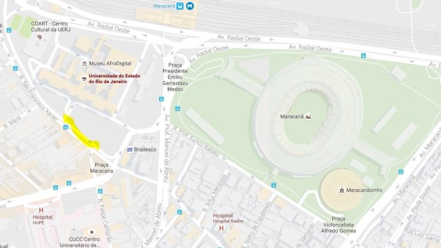 A man was found dead outside Rio's state university (yellow) near Maracana Stadium, the site of the Rio Olympics Opening Ceremony.