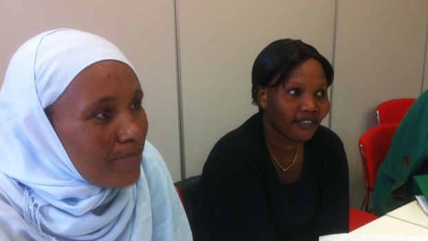 Meseret Pa'Sende Ku and Nada Hassan Koko from Sudan learning English at the Southbank TAFE in an Adult Migrant English class.