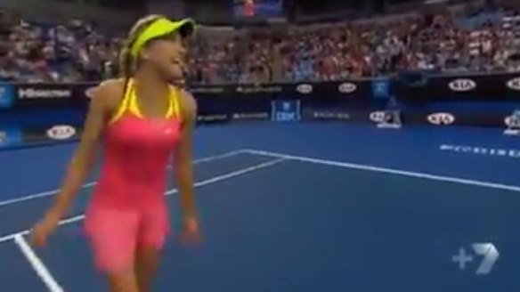 Twirl: Eugenie Bouchard complies with the interviwer's request.