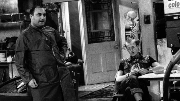 Alexei Sayle and Ade Edmonson on the set of <i>The Young Ones</i>.