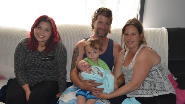  Happy family: Australind mother Rachael Camilleri (right) recently gave birth to baby Zahn with the help of her partner Ben Quinn and her other children Zara and Zekk.