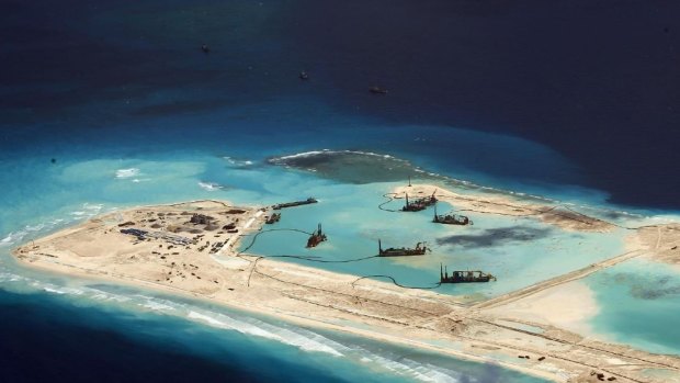 China has been building aircraft hangars on the disputed Spratly Islands.