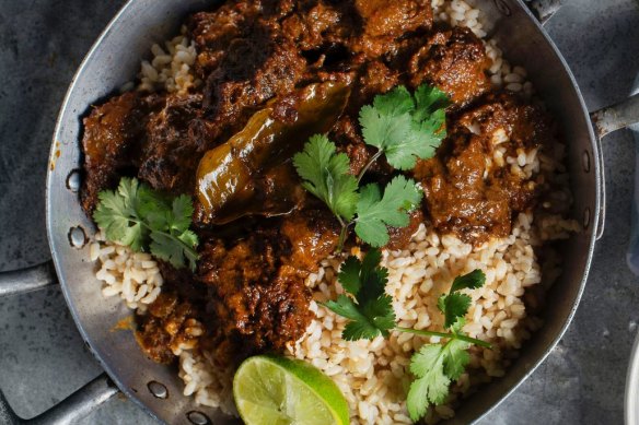 Perfect pairing: Beef rendang curry and turmeric greens.