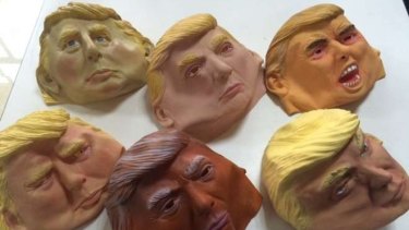 What's behind the mask? Donald Trump insists he has no business deals in Russia.