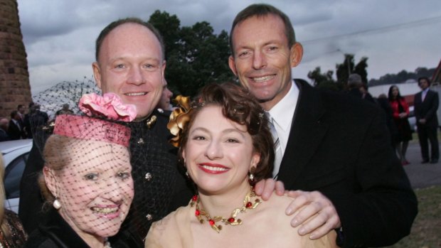 Bronwyn Bishop at the wedding of Sophie Mirabella, with Prime Minister Tony Abbott and another wedding guest, in 2006. 