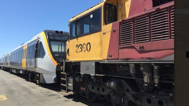 The old and the new - Queensland Rail's new trains arrive at the Port of Brisbane. 