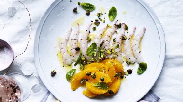 Scampi crudo with orange, pistachio and mint. <a href="http://www.goodfood.com.au/good-food/christmas-feasts/recipe/scampi-crudo-with-orange-pistachio-and-mint-20141209-3m5bx.html"><b>(Recipe here).</b></a>