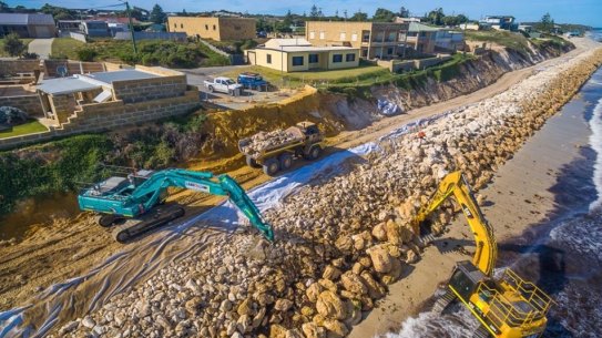 The seawall of nearly 600 metres is to protect 15 homes and now a public reserve with a car park, boat ramp, access road and boardwalk. 