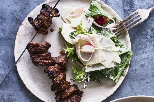 Brined, glazed and barbecued beef skewers with a bitter leaf salad with horseradish and lemon. 
