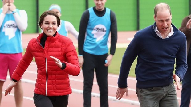 Kate Middleton lets Prince William beat her during a race for a London Marathon training day in London on Sunday.