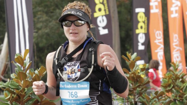 Erin Swain running her first marathon in Canberra in 2015