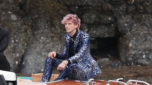 Machine Gun Kelly arrives at the wedding.