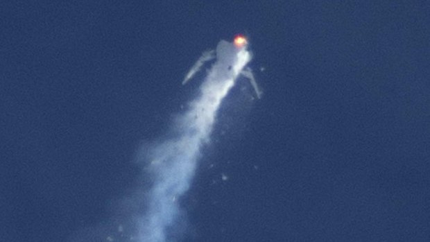 The Virgin Galactic SpaceShipTwo rocket breaks up in mid-air during a test flight.. 
