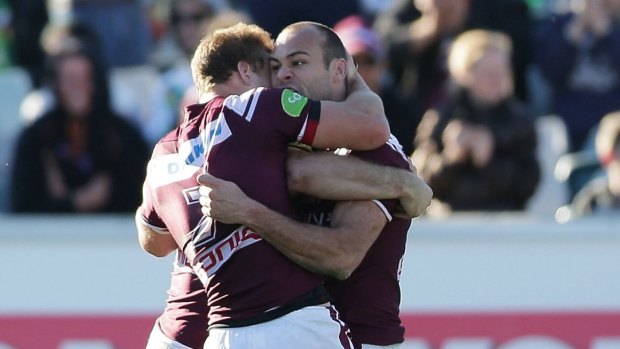 Brett Stewart of the Sea Eagles celebrates scoring the match-winning try with Daly Cherry-Evans.
