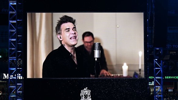 British performer Robbie Williams performed Angels in tribute. “He also had the ability, just by being himself, to transcend tribalism ... Warnie being Warnie,” Williams said.