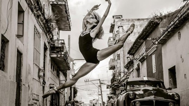 Dancer Barbara Patterson Sanchez crosses a Havana street in style.