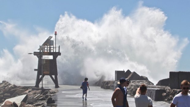 A monster wave that washed a woman off Nobbys breakwall in Newcastle.