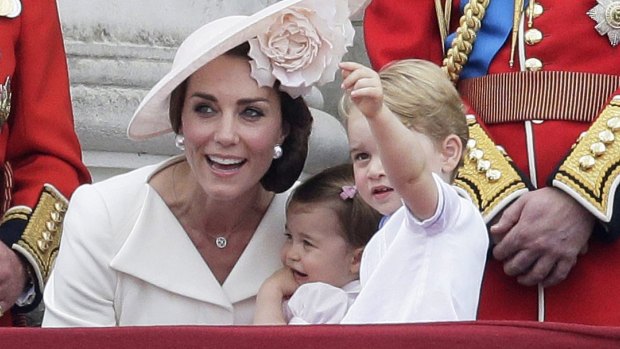 Princess Charlotte clung to mother Kate as  aircraft roared overhead. 