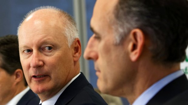 Going out on a high: Richard Goyder (left), with his replacement Rob Scott. 