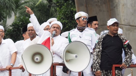 Islam Defenders' Front protesters led by Muhammad Rizieq Shihab (pointing) demand the sacking of police officials over treatment of their activists in Jakarta in January.