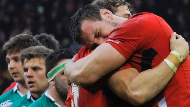 Hanging tough: Sam Warburton (right) celebrates with Leigh Halfpenny after Wales' gritty Six Nations win over Ireland.
